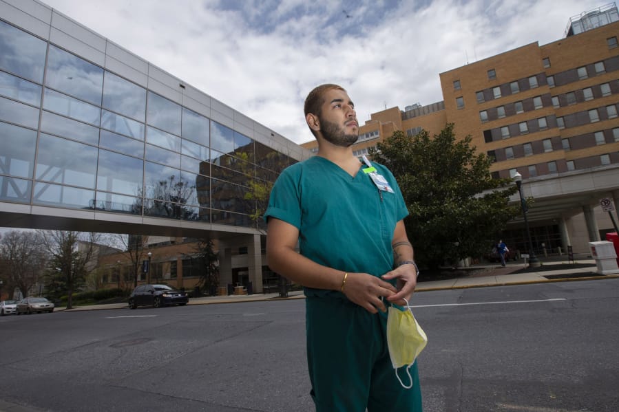DACA recipients have been drawn to health care. &quot;It&#039;s out of compassion, and the dire necessity we see in our communities,&quot; said Jonatan Quintino Juarez, 23, a medical assistant at Penn Medicine Lancaster General Health, who is finishing nursing school. He is shown outside the hospital on April 16, 2020.