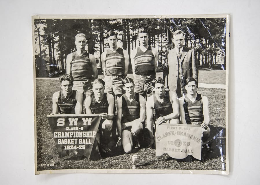 A photo, provided by Dorothy Brown, shows the Yacolt High School Loggers, which earned third place at the 1925 basketball state tournament at the University of Washington. Bottom row, from left: Marion Roper, Carl Olson, Clarence Grady, Charles Work, and Ernest White. Top row, from left: Rob Huffman, Charlie White, Fred Huffman, and coach Glen Hill.