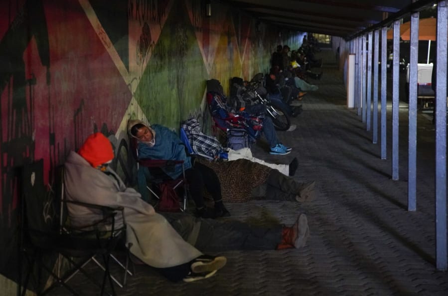 At the pedestrian crossing people sleep in line waiting for the border to open. People have been sleeping in their cars at the Otay border to wait for the port of entry to open; it started happening after the hours of service of the border port of entry were reduced.