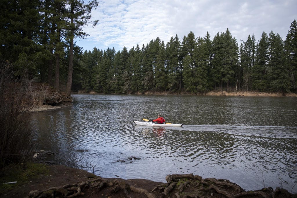 Jerry Ames of Vancouver kayaks on Lacamas Lake in Camas in December. Clark County residents fond of the open air may be headed to the water soon with Gov. Jay Inslee allowing outdoor recreation, and officials have a warning: area lakes and rivers are still frigid.