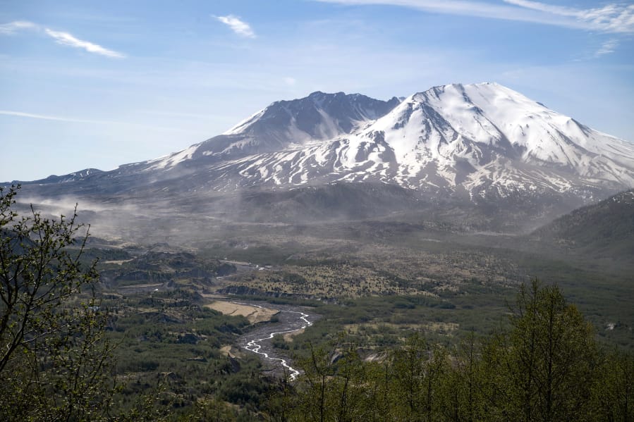 Mount St. Helens is serene on a recent morning, but its May 18, 1980, eruption was catastrophic. Subsequent eruptions ending as recently as 2008 built lava domes in the crater.