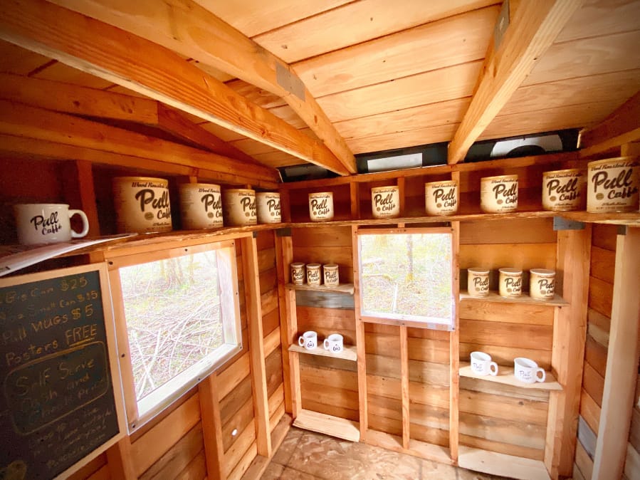Pull Caffe has been selling coffee out of a small cabinlike structure at the entrance of its property in Yacolt. Buyers pay through an honor system. Owner Todd Millar said he sells an average of four cans per day. He got the honor-system idea from an OPB show about pies.