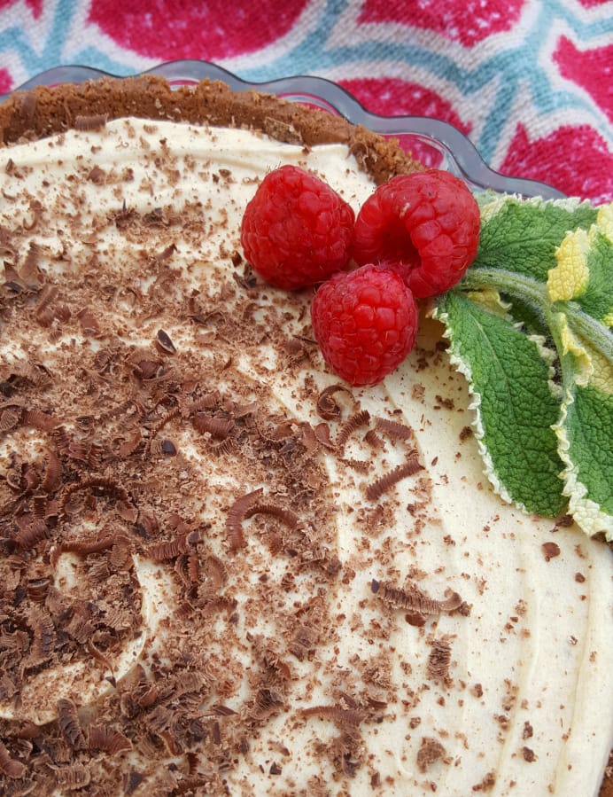 This indulgent pie is rich but not heavy, a frozen fluffy treat garnished with grated chocolate.