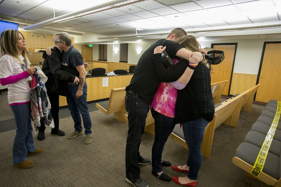 Members of Hartley Anderson&#039;s family embrace in the courtroom after the sentencing of Ryan Burge, who was convicted of murdering the 5-year-old girl, in Clark County Superior Court on Friday afternoon. Burge was sentenced to 40 years in prison. Family members are Hartley&#039;s grandmother Carla Luchau, father Peter Anderson, grandfather Tim Luchau, uncle T.J. Luchau, mother Nataasha Tafoya and aunt Whitney Nailon.