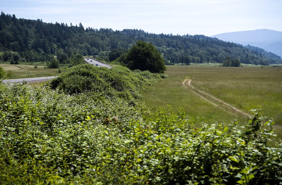 Construction at Steigerwald Lake National Wildlife Refuge, seen Friday, will include raising state Highway 14.