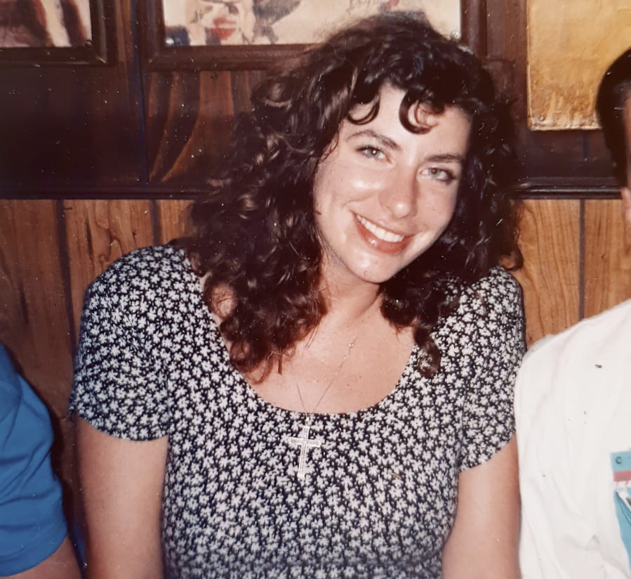 This photo provided by Tara Reade, shows Tara Reade out with friends in Washington, in 1992 or 1993, during the time she worked for then- Sen. Joe Biden, D-Del.