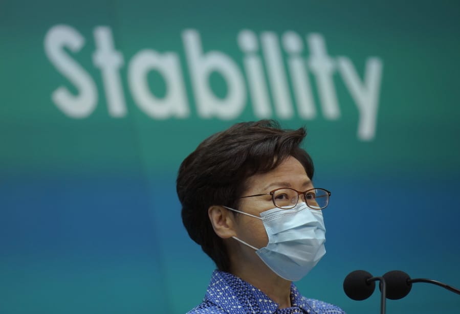 Hong Kong Chief Executive Carrie Lam listens to reporters&#039; questions during a press conference in Hong Kong, Tuesday, May 26, 2020. Lam tried again Tuesday to defend a new national security law that China&#039;s parliament is going to impose on Hong Kong.