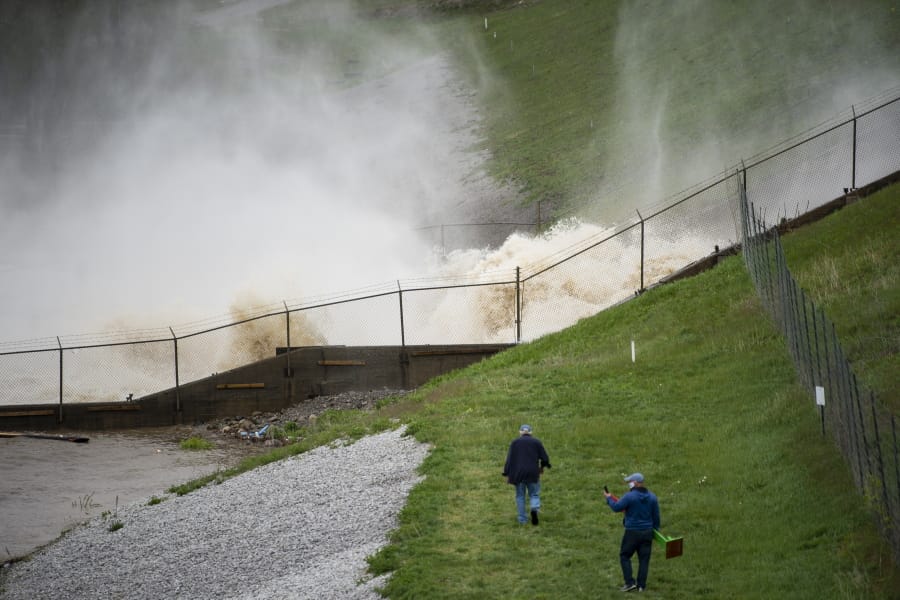 This photo shows a view of a dam on Wixom Lake in Edenville, Mich., Tuesday, May 19, 2020. People living along two mid-Michigan lakes and parts of a river have been evacuated following several days of heavy rain that produced flooding and put pressure on dams in the area.