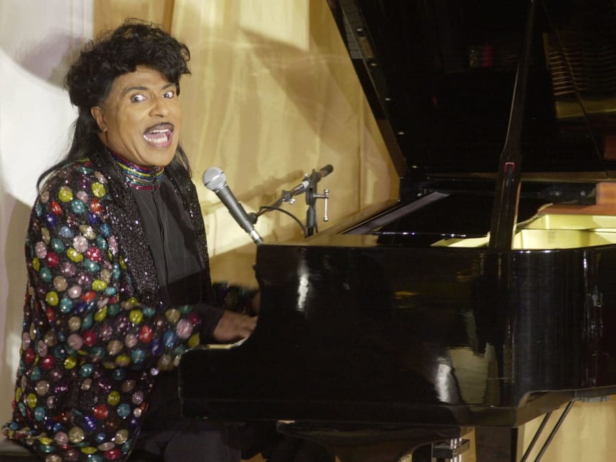 FILE - In this July 22, 2001 file photo, Little Richard performs at the 93rd birthday and 88th year in show business gala celebration for Milton Berle, in Beverly Hills, Calif. Little Richard, the self-proclaimed &quot;architect of rock &#039;n&#039; roll&quot; whose piercing wail, pounding piano and towering pompadour irrevocably altered popular music while introducing black R&amp;B to white America, has died Saturday, May 9, 2020.