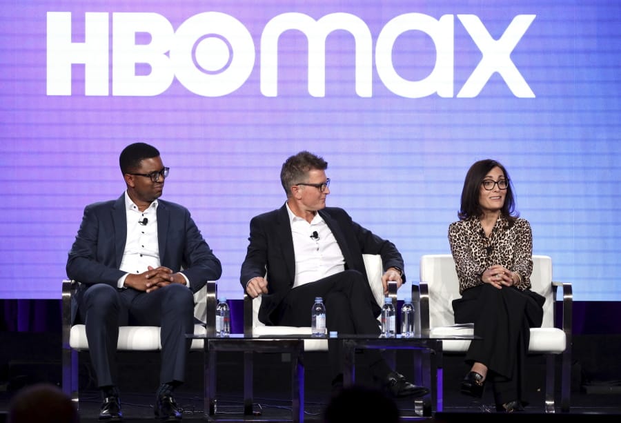 FILE - In this Jan. 15, 2020, file photo, EVP of Content Acquisitions for TNT, TBS, truTV, HBO &amp; HBO MAX Michael Quigley, from left, Chief Content Officer, HBO MAX and President, TNT,TBS, &amp; truTV Kevin Reilly and Head of Original Content , HBO MAX Sarah Aubrey appear at the HBO Max Executive Sessions panel during the HBO TCA 2020 Winter Press Tour at the Langham Huntington in Pasadena, Calif.