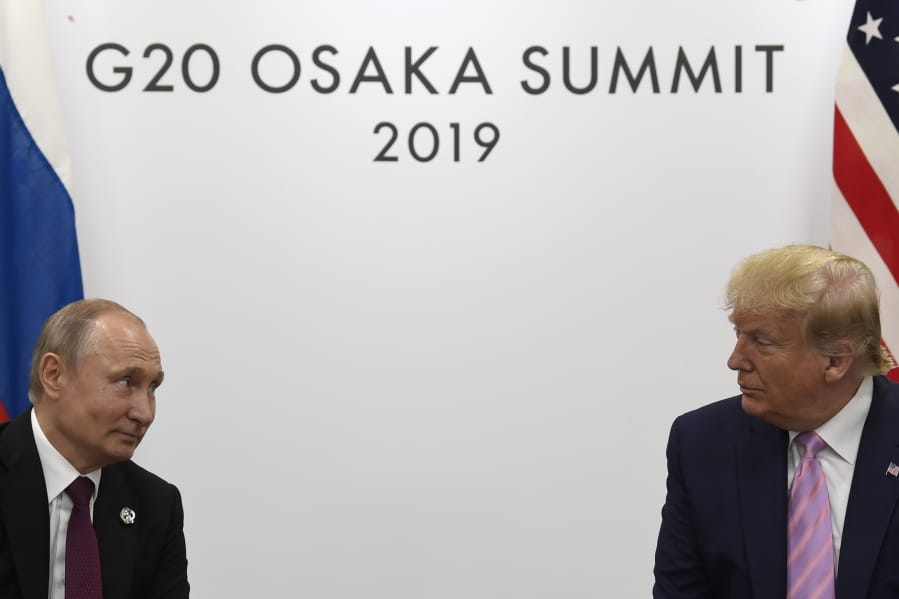 FILE - In this June 28, 2019, file photo President Donald Trump, right, meets with Russian President Vladimir Putin during a bilateral meeting on the sidelines of the G-20 summit in Osaka, Japan. If Trump doesn&#039;t extend the New Strategic Arms Reduction Treaty, only remaining U.S.-Russia arms control pact, or succeed in negotiating a replacement treaty,  it will expire on Feb. 5, 2021.