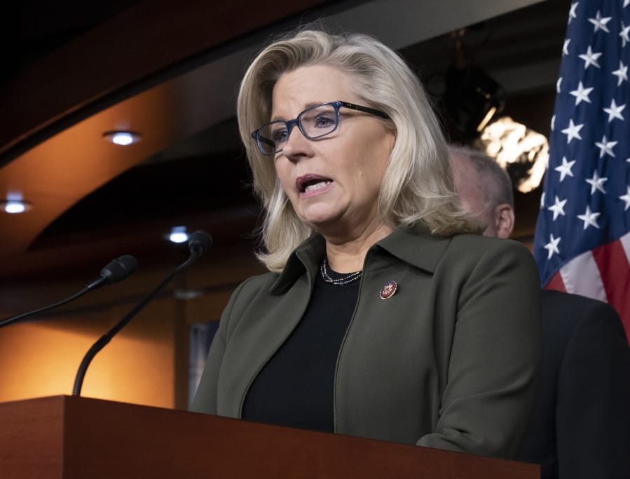 FILE - In this Dec. 17, 2019 file photo, Republican Conference chair Rep. Liz Cheney, R-Wyo., speaks with reporters at the Capitol in Washington. The United States is on track to withdraw several thousand troops from Afghanistan as agreed in February, even as violence flares and the Taliban and the Afghan government have failed to start peace talks. (AP Photo/J.