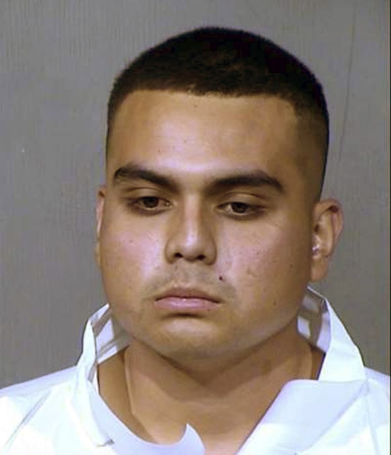 This booking photo provided by the Maricopa County Sheriff&#039;s Office shows 20-year-old Armando Hernandez Jr., who was arrested on suspicion of aggravated assault and other crimes in a shooting Wednesday, May 20, 2020, near a shopping and entertainment district in Glendale, Ariz. Three people were injured, one critically. It&#039;s unknown whether Hernandez&#039;s has been assigned an attorney who can comment on his behalf.