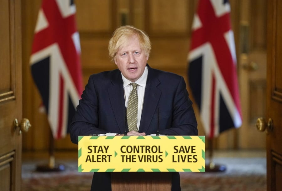 In this photo issued by 10 Downing Street, Britain&#039;s Prime Minister Boris Johnson speaks during a media briefing on coronavirus in Downing Street, London, Sunday May 24, 2020. Boris Johnson says he won&#039;t fire his chief aide Dominic Cummings for allegedly violating the national coronavirus lockdown rules that he helped to create.