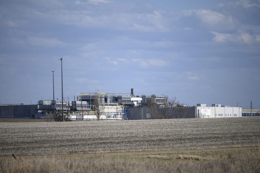 FILE - This April 18, 2020, file photo, shows the JBS USA Pork Plant in Worthington, Minn. Officials estimate that about 700,000 pigs across the nation can&#039;t be processed each week and must euthanized. Most of the hogs are being killed at farms, but up to 13,000 a day also may be euthanized at the JBS pork plant in Worthington.