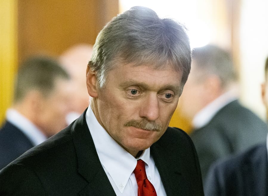FILE - In this Friday, Feb. 7, 2020 file photo Kremlin spokesman Dmitry Peskov arrives to attend the talks between Russian President Vladimir Putin and Belarusian President Alexander Lukashenko in Rosa Khutor, in the Black Sea resort of Sochi, Russia. Russian President Vladimir Putin&#039;s spokesman Peskov said Tuesday May 12, 2020, that he is hospitalized with the coronavirus. The announcement comes just a day after Putin said Russia was successful in slowing down infections and announced easing some of the nationwide lockdown restrictions.