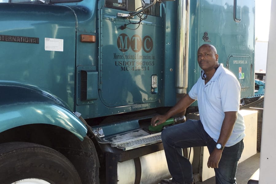 This April 29, 2020 photo provided by Rodney Morine, shows Morine preparing to make a delivery in Opelousas, La. Morine believes his second chance is no better than his first to secure a loan through a government program intended to help small businesses like his survive the pandemic. &quot;I have zero confidence,&quot; said Morine, an independent truck driver in Opelousas, Louisiana, whose revenues have dropped by half since the coronavirus outbreak hit the U.S.