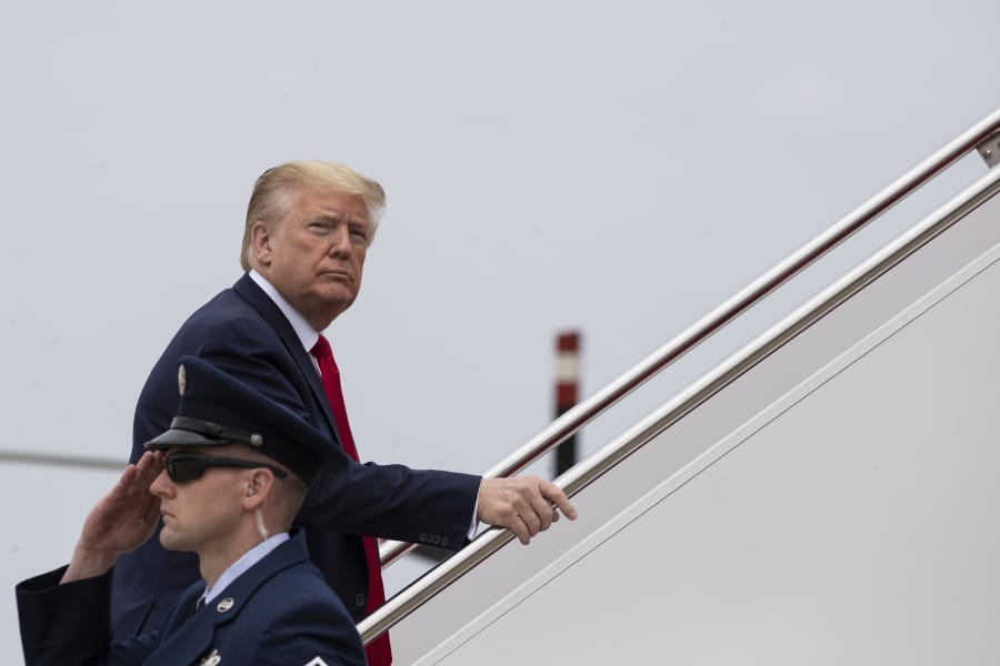 President Donald Trump boards Air Force One as he departs Thursday, May 21, 2020, at Andrews Air Force Base, Md. Trump will visit a Ypsilanti, Mich., Ford plant that has been converted to making personal protection and medical equipment.