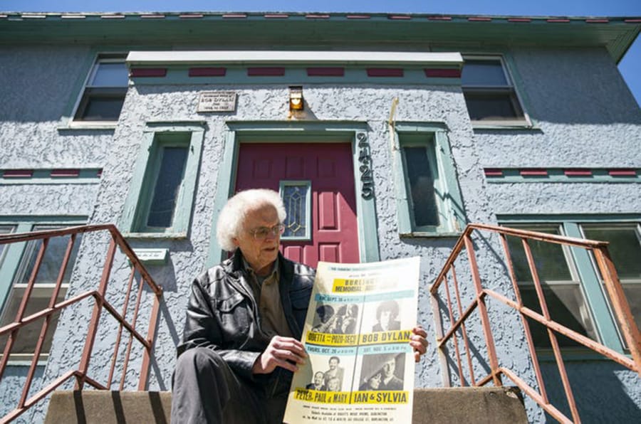 Bill Pagel on the steps of Bob Dylan&#039;s home in Hibbing, Minn., which he badgered the owners for years to sell to him. He admits he paid a premium because of its history.