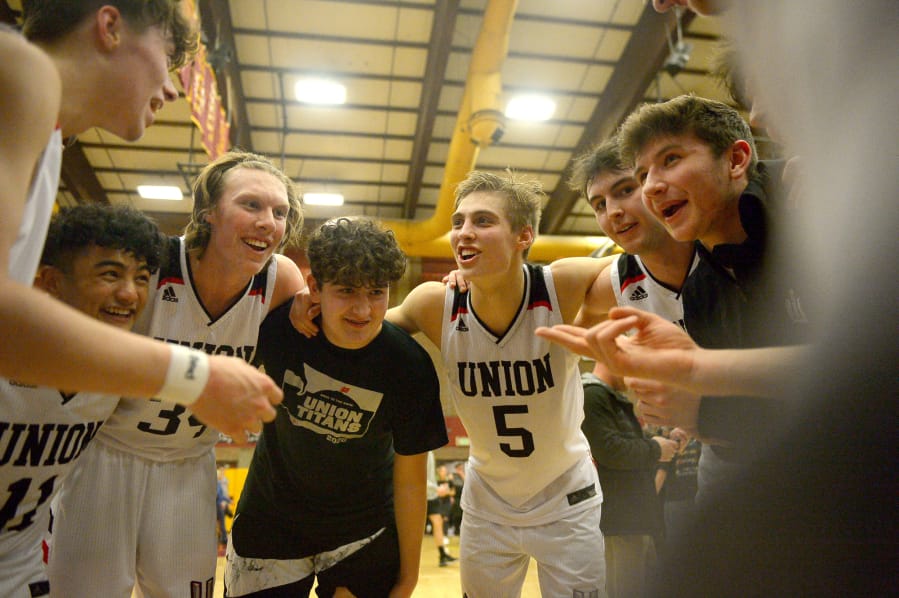 Spencer McGuire (third from left) tried out for the Union High School basketball team at the urging of Tanner Toolson (5) (Samuel Wilson for The Columbian)