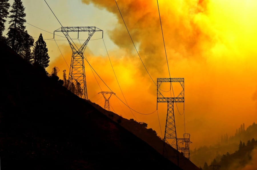 The Camp Fire burns near Pulga, Calif. A Wall Street Journal story linked the blaze to maintenance delays on PG&amp;E power lines.