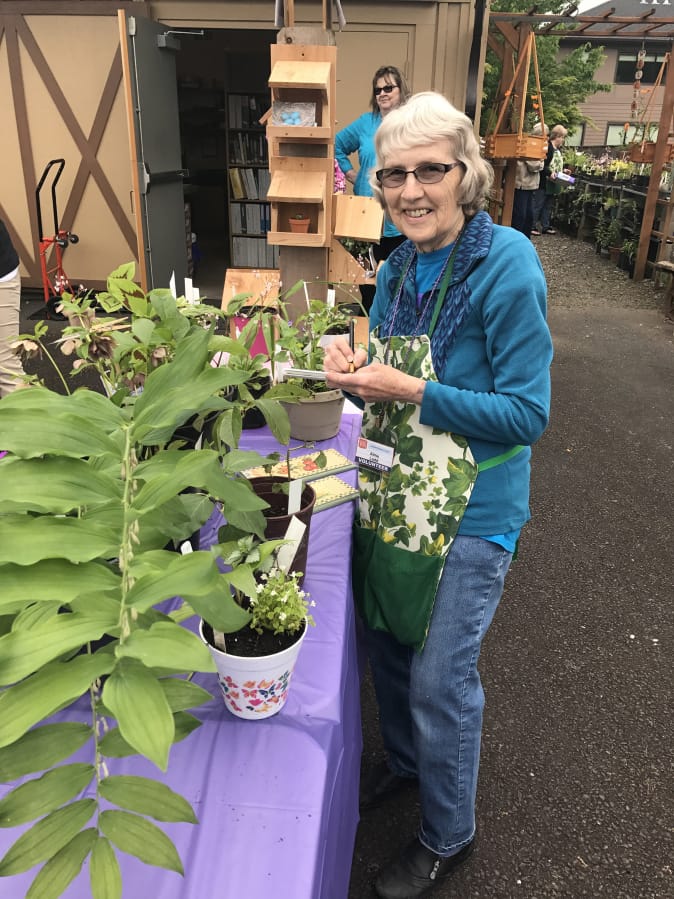 Plant Fair organizer and Two Rivers Heritage Museum &quot;plant lady&quot; Alma Ladd at a previous plant fair.