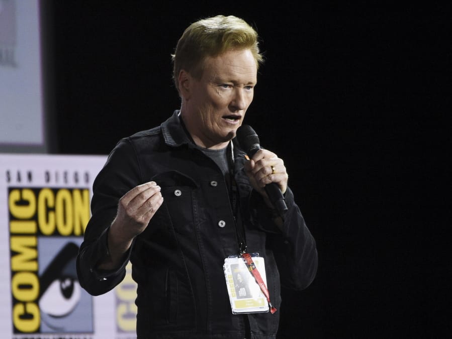 FILE - In this July 18, 2019, file photo, Conan O&#039;Brien introduces Tom Cruise to present a clip from &quot;Top Gun: Maverick&quot; on day one of Comic-Con International in San Diego. Six of America&#039;s late-night television comedy hosts - five of them white men - turned serious after the nation&#039;s weekend of unrest following the death of George Floyd to suggest they and others need to do more than talk about racism. It has become a ritual - a somewhat inexplicable one, as TBS&#039; O&#039;Brien noted - for these comics to come on the air after acts of terrorism, school shootings or other national traumas to try and make sense of them for their audiences.