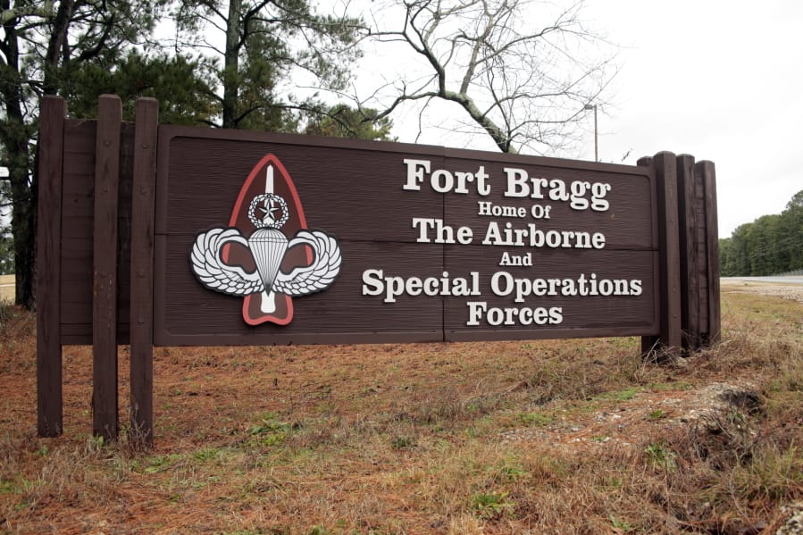 FILE - In this Jan. 4, 2020, file photo a sign for at Fort Bragg, N.C., is shown. Defense Secretary Mark Esper and Army Secretary Ryan McCarthy, both former Army officers, put out word that they are &quot;open to a bipartisan discussion&quot; of renaming Army bases like North Carolina&#039;s Fort Bragg that honor Confederate officers associated by some with the racism of that tumultuous time.