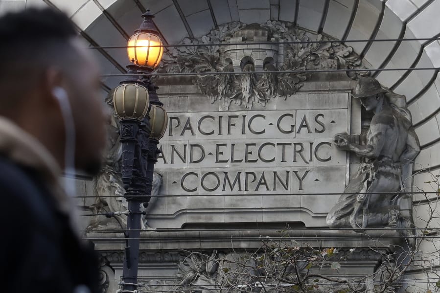 FILE - In this Dec. 16, 2019, file photo, a sign to a Pacific Gas &amp; Electric building is shown in San Francisco. A federal judge is expected opn Friday, June 19, 2020, to approve Pacific Gas &amp; Electric&#039;s $58 billion plan for ending its 17-month stint in bankruptcy, clearing the way for the nation&#039;s largest utility to begin paying $25.5 billion to cover the losses in a series of horrific wildfires ignited by its long-neglected electrical grid.