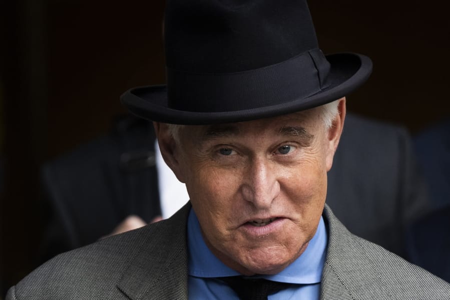 FILE - In this Nov. 12, 2019, file photo Roger Stone leaves federal court in Washington. A federal judge is giving Stone, a longtime ally and confidant of President Donald Trump, an additional two weeks before he must report to serve his federal prison sentence.