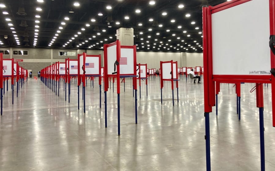 Voting stations are set up for the primary election at the Kentucky Exposition Center, Monday, June 22, 2020, in Louisville, Ky. With one polling place designated for Louisville on Tuesday, voters who didn&#039;t cast mail-in ballots could potentially face long lines in Kentucky&#039;s unprecedented primary election.