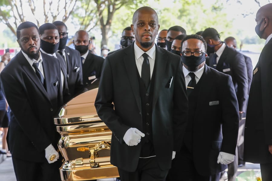 Pallbearers bring the coffin into The Fountain of Praise church in Houston for the funeral for George Floyd on Tuesday, June 9, 2020. Floyd died after being restrained by Minneapolis Police officers on May 25. (Godofredo A.