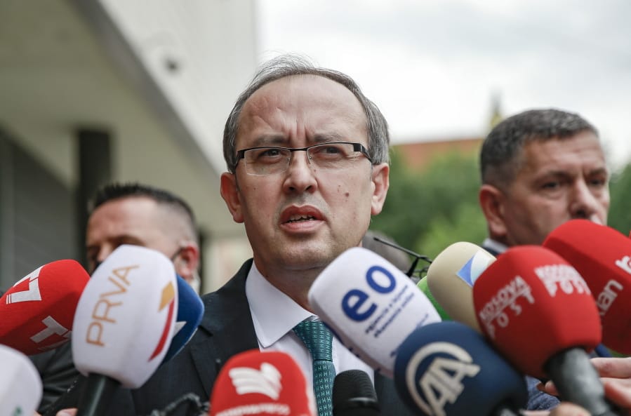 Newly elected prime minister Avdullah Hoti, speaks to the media, in the capital Pristina, Wednesday, June 3, 2020. Kosovo&#039;s parliament voted in a new prime minister Wednesday to lead a fragile coalition government that will inherit the economic impact of the coronavirus pandemic and stalled normalization talks with neighboring Serbia.