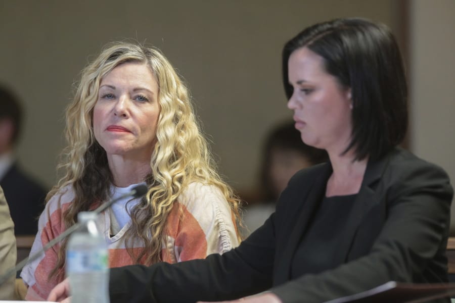 FILE - In this March 6, 2020, file photo, Lori Vallow Daybell glances at the camera during her hearing, with her defense attorney, Edwina Elcox, right, in Rexburg, Idaho. Prosecutors say the mother of two children who were found dead in rural Idaho months after they vanished in a bizarre case that captured worldwide attention had conspired with her new husband to hide or destroy the kids&#039; bodies. The new felony charges against Lori Vallow Daybell came late Monday, June 29, 2020, the latest twist in a case tied to the mysterious deaths of both of the couple&#039;s former spouses and their beliefs about zombies and the apocalypse.