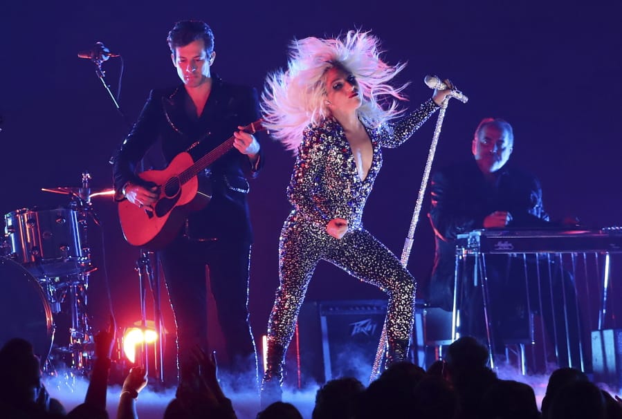 Lady Gaga, right, and Mark Ronson perform &quot;Shallow&quot; at the 61st annual Grammy Awards Feb. 10, 2019, in Los Angeles.