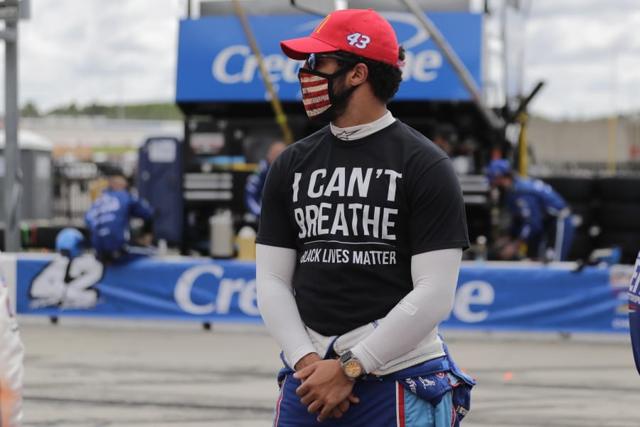 Bubba Wallace (43) wears a &quot;I Can&#039;t Breath, Black Lives Matter&quot; shirt before a NASCAR Cup Series auto race at Atlanta Motor Speedway, Sunday, June 7, 2020, in Hampton, Ga.