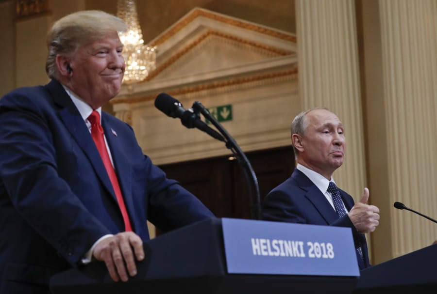 FILE - In this July 16, 2018, file photo Russian President Vladimir Putin, right, and U.S. President Donald Trump give a joint news conference at the Presidential Palace in Helsinki, Finland. For the past three years, the administration has careered between President Donald Trump&#039;s attempts to curry favor and friendship with Vladimir Putin and longstanding deep-seated concerns about Putin&#039;s intentions.