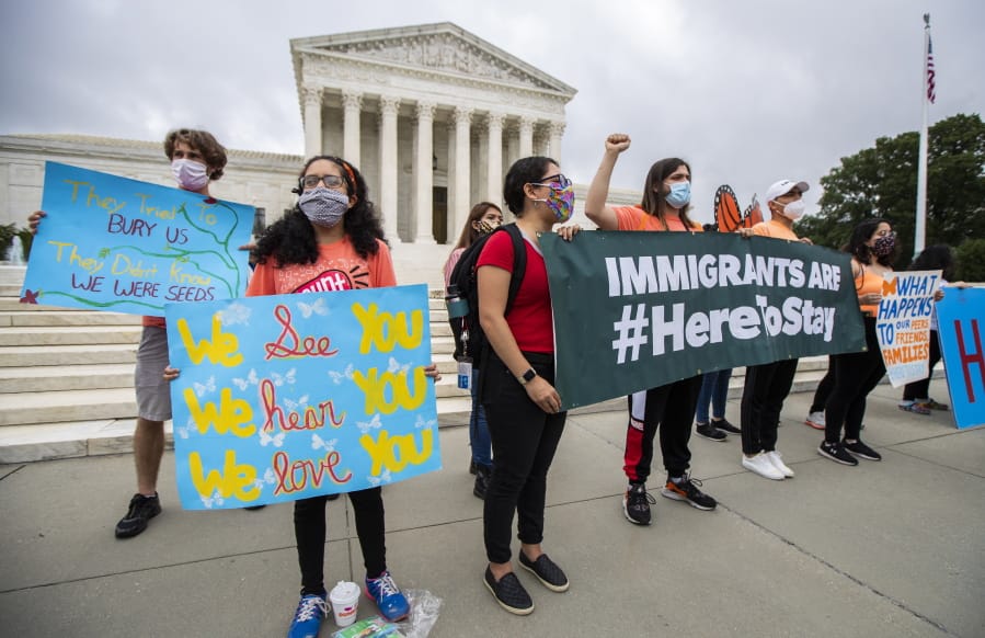 Deferred Action for Childhood Arrivals (DACA) students celebrate in front of the U.S. Supreme Court after the Supreme Court rejects President Donald Trump&#039;s bid to end legal protections for young immigrants, Thursday, June 18, 2020, in Washington.