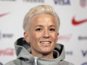 FILE - In this May 24, 2019, file photo, Megan Rapinoe, a member of the United States women&#039;s national soccer team, speaks to reporters during a news conference in New York. Seahawks quarterback Russell Wilson, soccer star Megan Rapinoe and three-time WNBA champion Sue Bird will preside over The ESPYS two-hour broadcast airing June 21 on ESPN. All three live in the Seattle area. Rapinoe and Bird are partners who share a household, which conveniently eases some logistics. Wilson&#039;s singer-wife, Ciara, is likely to make an appearance, too.