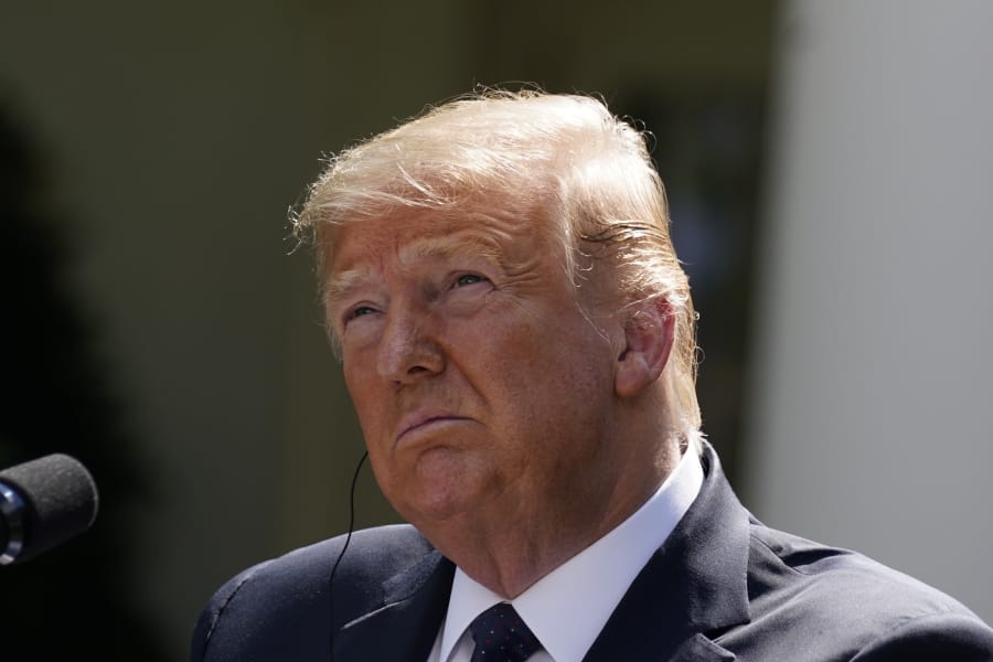President Donald Trump listens during a news conference with Polish President Andrzej Duda in the Rose Garden of the White House, Wednesday, June 24, 2020, in Washington.