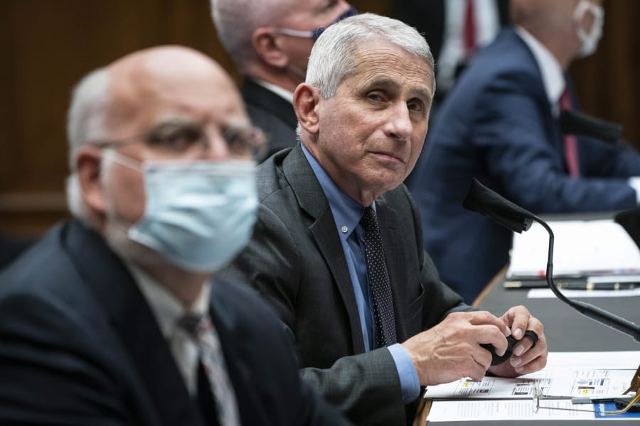 Dr. Robert Redfield, director of the Centers for Disease Control and Prevention, left, Director of the National Institute of Allergy and Infectious Diseases Dr. Anthony Fauci, second from left, listen during a House Committee on Energy and Commerce on the Trump administration&#039;s response to the COVID-19 pandemic on Capitol Hill in Washington on Tuesday, June 23, 2020.