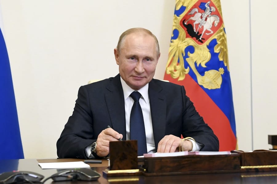 Russian President Vladimir Putin, attends a meeting via teleconference at the Novo-Ogaryovo residence outside Moscow, Russia, Monday, June 1, 2020. Putin set a nationwide vote on constitutional amendments allowing him to extend his rule for July 1.