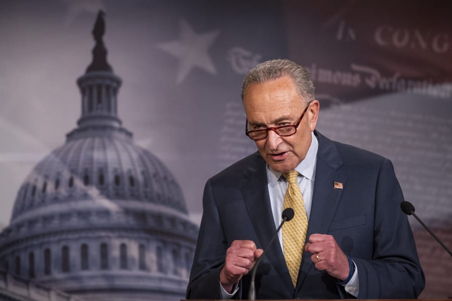 In this June 16, 2020 photo, Senate Majority Leader Chuck Schumer of N.Y., speaks during a news conference on Capitol Hill in Washington.