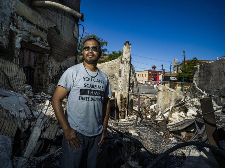 Ruhel Islamis restaurant was destroyed. The owner of Gandhi Mahal said &quot;let my building burn, justice needs to be served.&quot; He plans to rebuild on the original site.