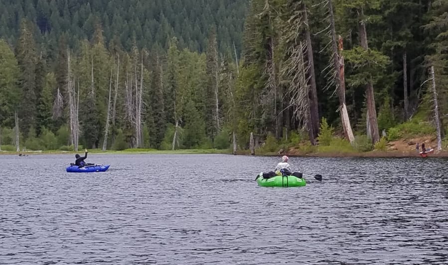 Anglers ply Goose Lake for trout recently. The lake is perfect for fishing from a small craft, and fishing has been excellent. Anglers are taking trout on just about everything.
