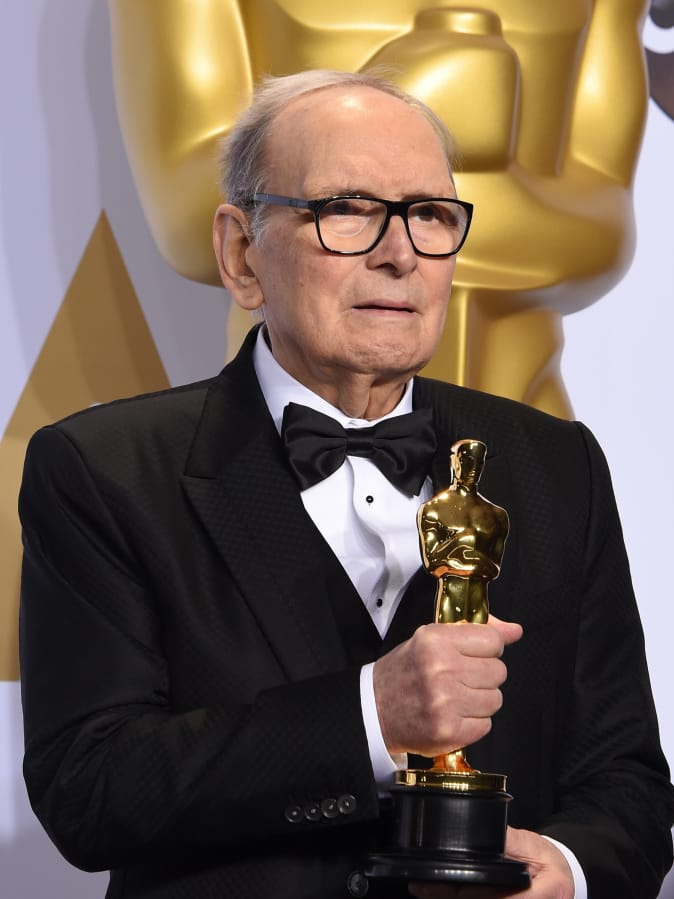 Composer Ennio Morricone poses with the Oscar for Best Original Score, &quot;The Hateful Eight,&quot; in the press room during the 88th Oscars in Hollywood on February 28, 2016. The Oscar-winning Italian composer Morricone has died at 91.