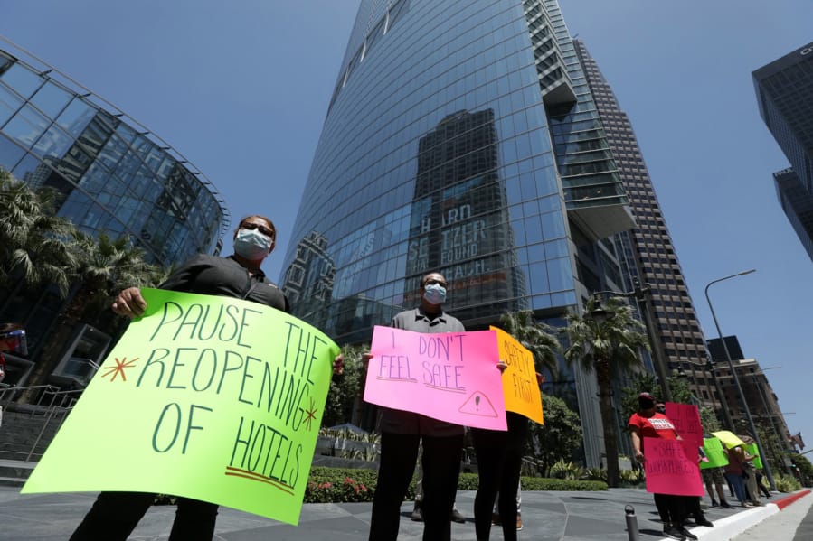 Hotel workers protest for their safety in front of the InterContinental Los Angeles Downtown on Wednesday, July 8, 2020 in Los Angeles. (Myung J.