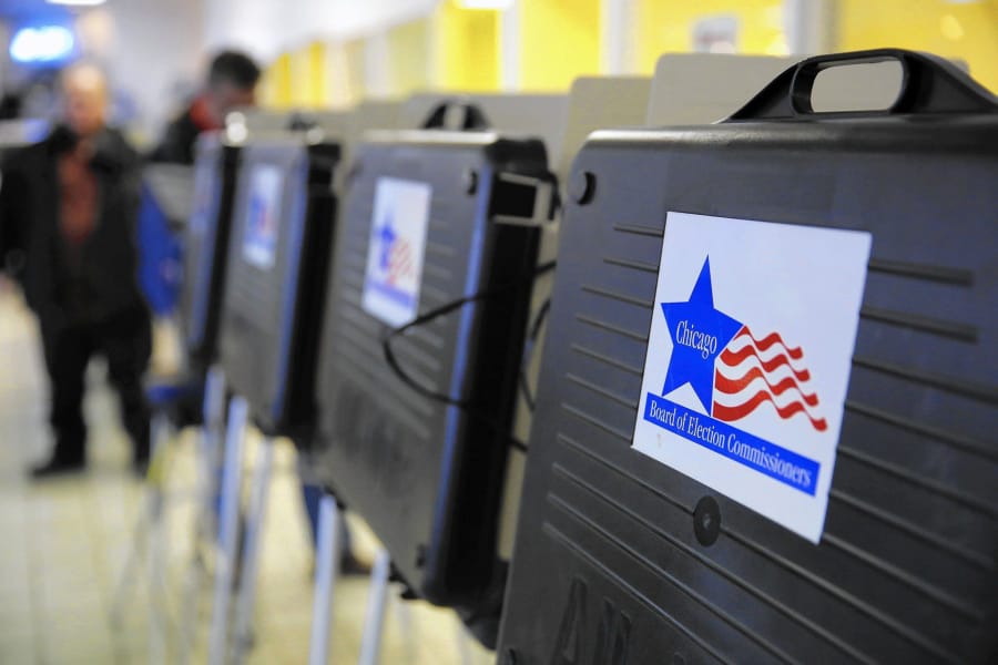 A row of voting booths in Chicago&#039;s Irving Park neighborhood on February 24, 2015. (Jose M.