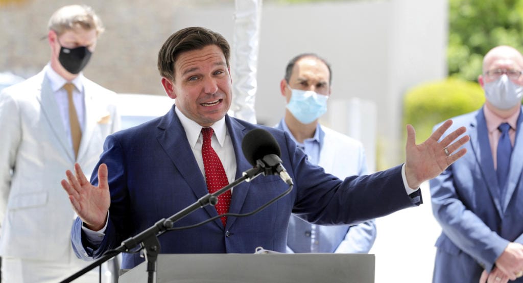 Florida Gov. Ron DeSantis gives an update on the state's response to the coronavirus pandemic during a press conference at Florida's Turnpike Turkey Lake Service Plaza, in Orlando, Fla., in a Friday, July 10, 2020 file photo. Florida on Sunday, July 13, 2020 reported the largest single-day increase in positive coronavirus cases in any one state since the beginning of the pandemic.