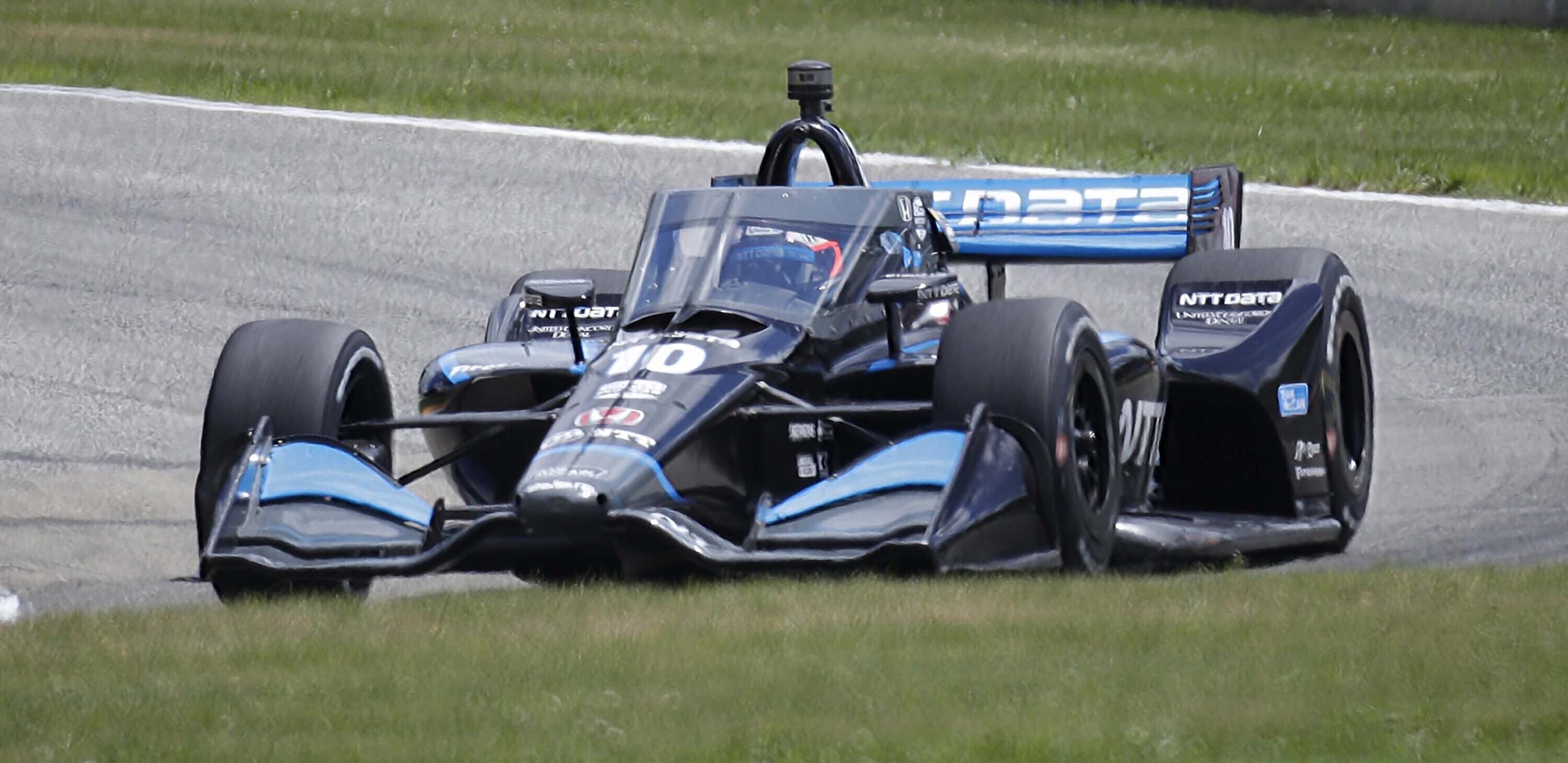 IndyCar driver Felix Rosenqvist (10) corners on Turn 3 during the REV Group Grand Prix auto race Sunday, July 12, 2020, at Road America in Elkhart Lake, Wis. (Gary C.